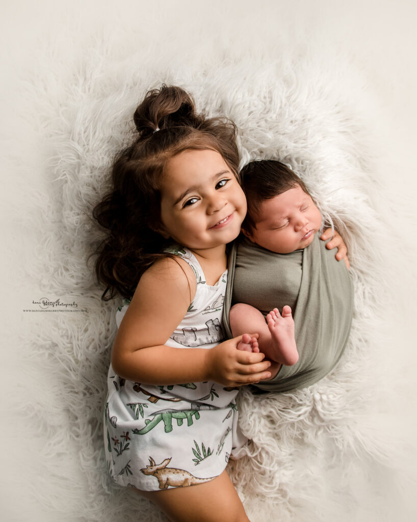 newborn sibling photos