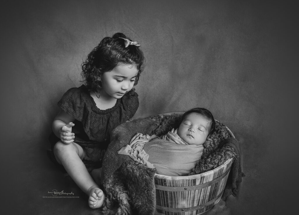 newborn sibling photos